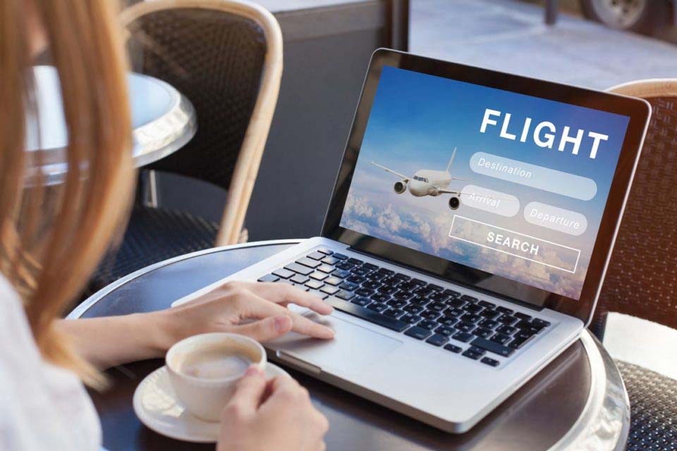 Como monitorar passagens aéreas para as férias