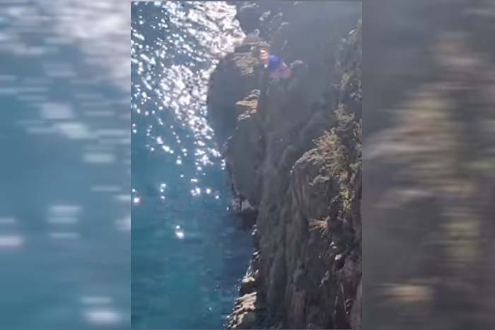 Mulher pula de penhasco e cai de cara na água 