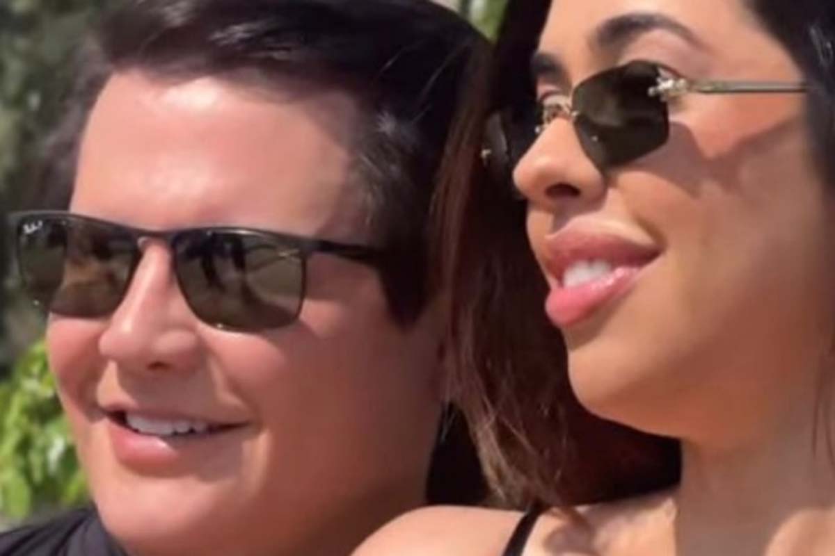 Giovani surge de mãos dadas com nova namorada