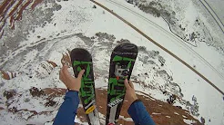 Esquiador da salto em queda livre de Pára-quedas 