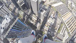 Jovem arrisca a vida em arranha-céu 