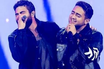 Dupla Henrique e Juliano tranquiliza fãs após queda de helicóptero